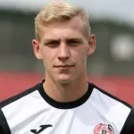 A. Szmidke