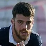 T. Iliadis